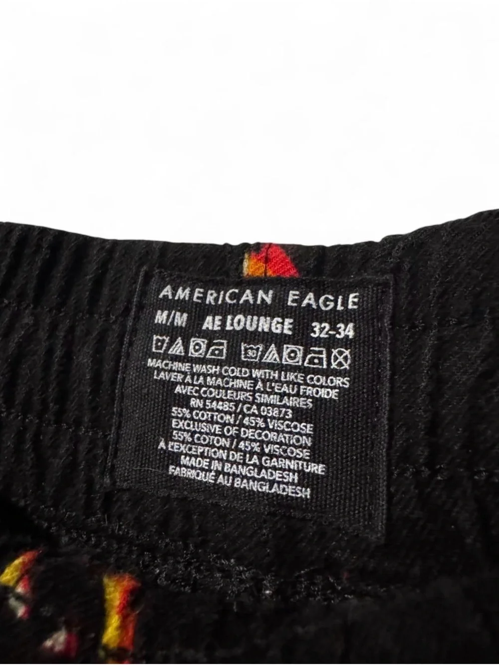 American Eagle Black Lounge Pants with Red and Yellow Accent